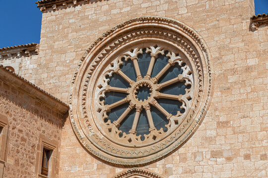 Soria, Spain. Close up of the thirteenth century transitional Gothic rose window at Santa Maria de Huerta monastery, featuring twelve radial columns and four borders carved with diamond tips