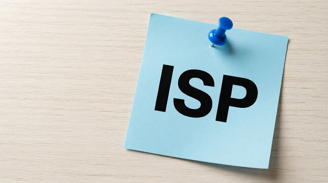 ISP acronym on blue sticky note pinned to wooden desk, business concept for internet service provider