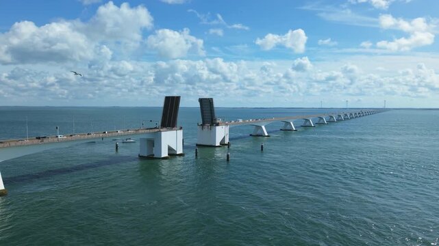 Zeeland Bridge with an open bascule section for maritime traffic passage on the Oosterschelde estuary in the Netherlands