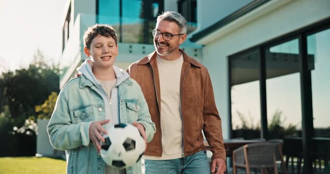 Ball, happy and dad with child in backyard for bonding, healthy relationship and development. Family, house and father with son for connection, talking and playing with football together on weekend