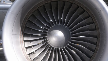 Fototapeta premium Close-up view of a jet engine's fan blades on an airplane