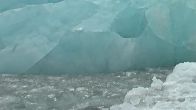 Witness colossal, ancient ice formations drifting in the pristine Arctic Ocean during a daring expedition.