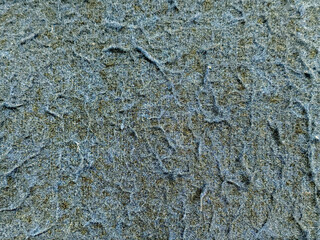 Close up of blue teal fabric with weathered and worn fiber fleece with rustic texture. Suede fabric type. Seamless background texture. © TMR Studio
