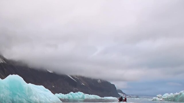 A small vessel gracefully navigates the Arctic Ocean, gliding past brilliant blue icebergs.