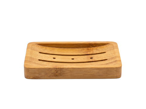 An empty bamboo soap dish rests on a clean surface, showcasing its natural grain and minimalist design, perfect for bathroom decor or sustainable living.