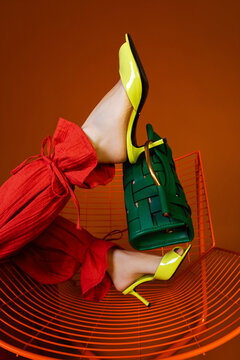 Woman's legs in lime green heels 