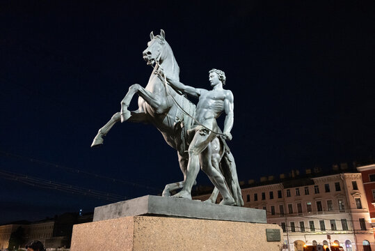 St. Petersburg, Russia - may 20, 2026: Sculpture tamer of horses at Anichkov bridge in St. Petersburg, Russia. Sculptor by Baron Peter Klodt.