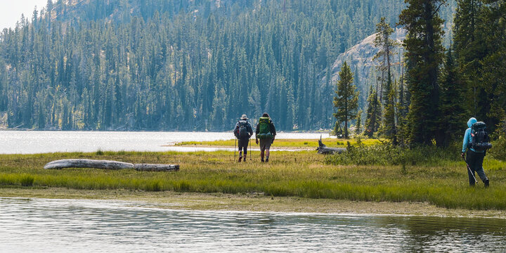Hiking near an alpine lake in the Beartooth Mountain Range