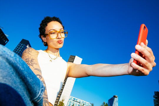 Woman Taking Urban Selfie