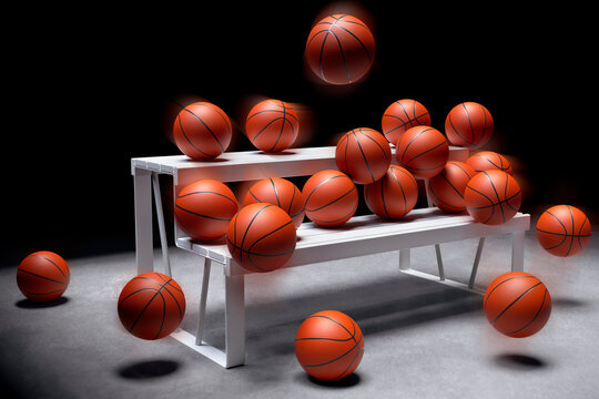 Many basketballs on a white bench. Sports action concept