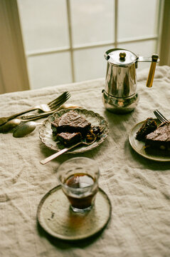 Brownies and Coffee on Linen Table Shot on Film