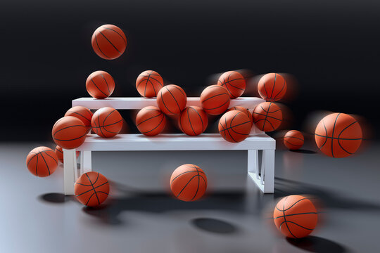 Many basketballs on a white bench. Sports action concept