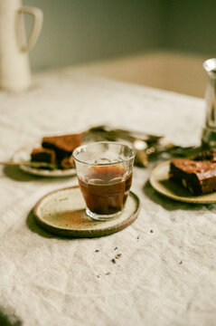 Brownies and Coffee on Linen Table Shot on Film