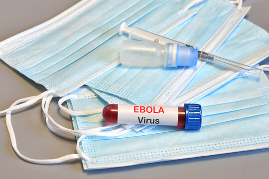Blood tube for test detection of virus Ebola on protective masks.