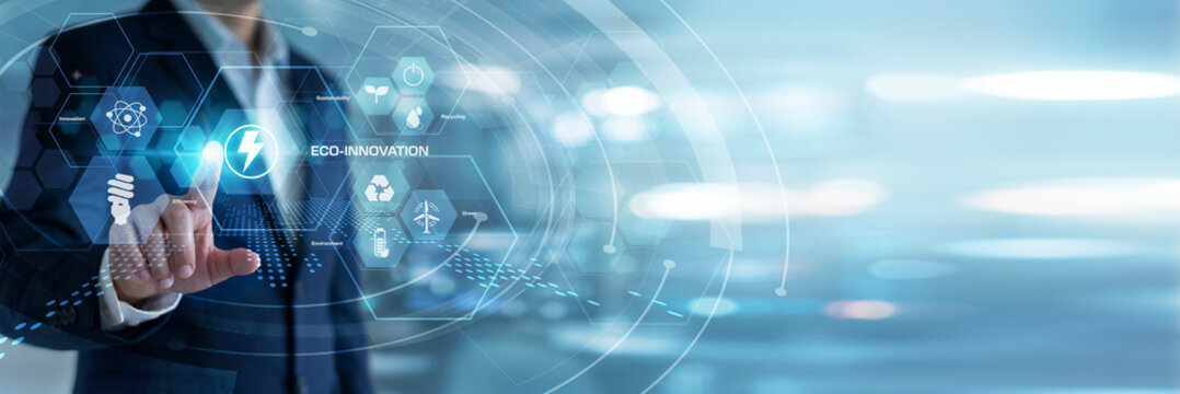 Environmental scientist analyzing and touching Eco-Innovation sustainability models on a glowing virtual screen. Renewable resource tracking, green technology development, and clean energy.