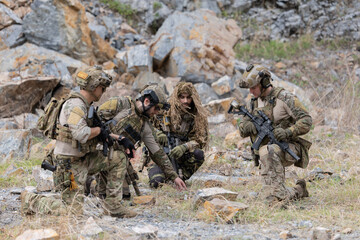Fototapeta premium Solders having a discussion about the patrol mission