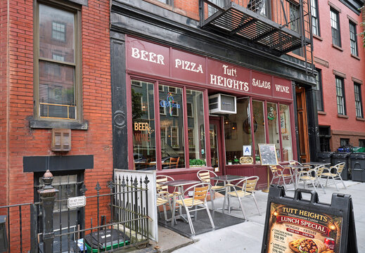 New York City, old apartment building with restaurant on the ground floor