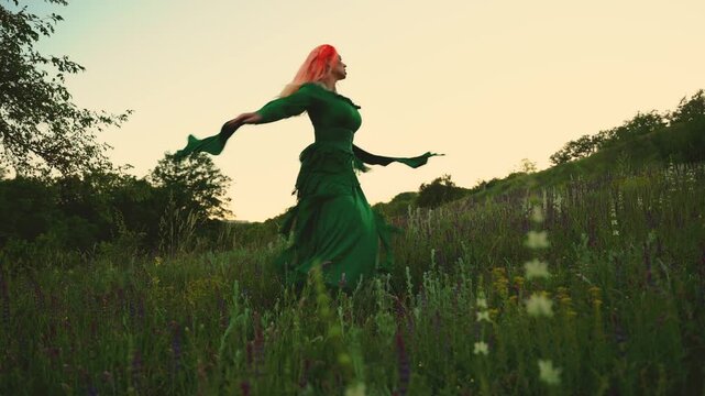 Fantasy woman spins dances hands raised to sky, high grass green meadow person enjoy beauty calm flowering field, Victorian dress old style medieval lady. mystery person sexy active happy joy elf girl