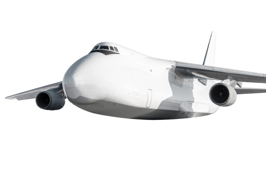 Big white cargo aircraft flies isolated