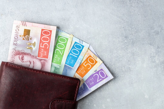 Swedish krona. Cash in wallet. SEK symbol. Close up. Copy space. Traditional form of payment. Financial concept, business background.