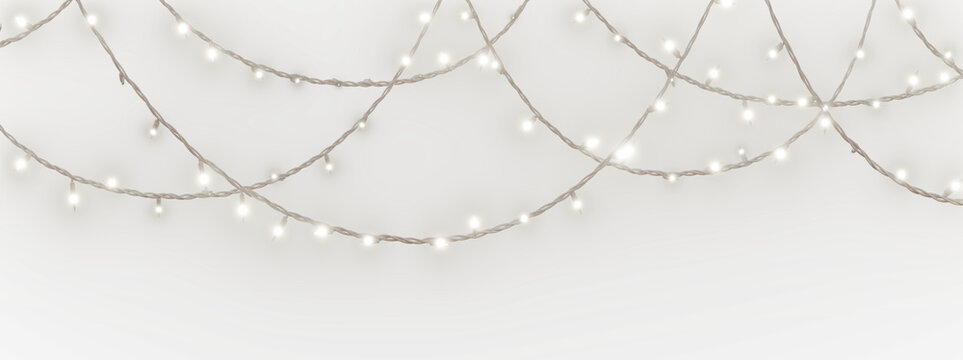 White Christmas lights with a white cable, isolated over a transparent background. 3D render.