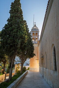 Bell tower of the Church of Agia Triada (Holy Trinity) in the village of Lefkes on Paros island in Greece on a sunny day.