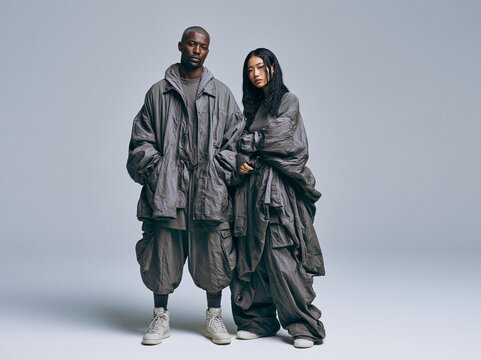 Two Models in Oversized Utility Streetwear Jackets