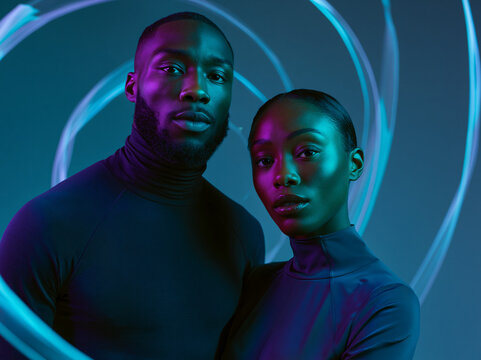 Two People in Neon Lighting Studio Portrait