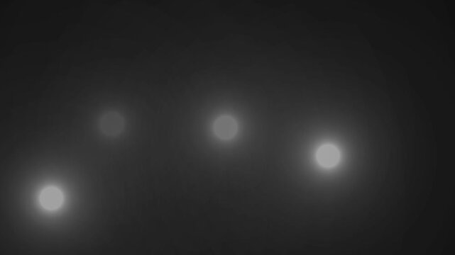 Paparazzi flashes of cameras on a black background. Camera flashes light animation overlay. Cinematic random bright blinking lights. The concept of popularity- Flashing lens flares seamless looping. 