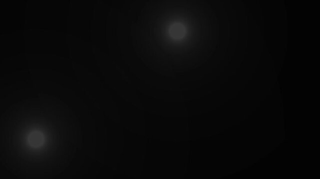 Paparazzi flashes of cameras on a black background. Camera flashes light animation overlay. Cinematic random bright blinking lights. The concept of popularity- Flashing lens flares seamless looping. 
