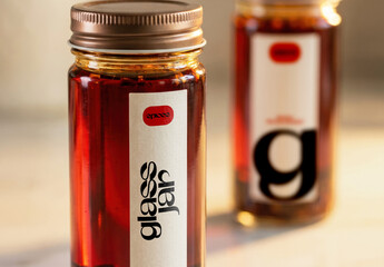 Glass Spice Jar Label Mockup on Marble Surface