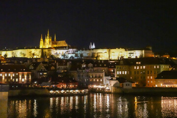 Obraz premium Prague, Czech Republic, March 27th 2026: Prague captivates with its centuries of history, elegant architecture, and winding streets, where Gothic spires, Baroque facades, and the Vltava River meet
