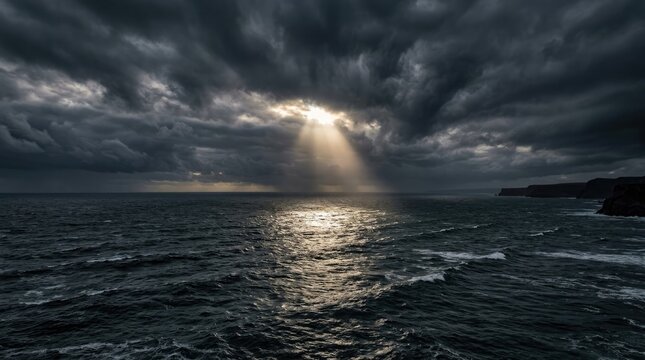 Dramatic halloween ocean background with dark clouds and sunbeam