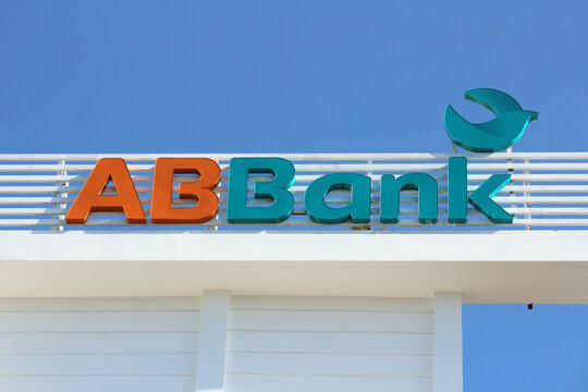 NHA TRANG, VIETNAM - JANUARY 26, 2026: A close-up view of the volumetric 3D ABBank corporate sign and logo on a building exterior against a clear blue sky.