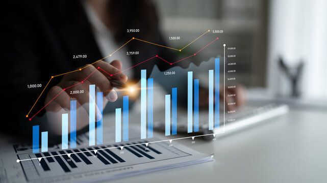 A professional examines financial data on a tablet in a modern office environment, focusing on trends and metrics to guide business decisions effectively. Scalp