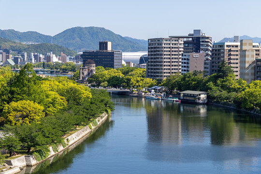 view of the motoyasu river with the peace park and motoyasu bridge