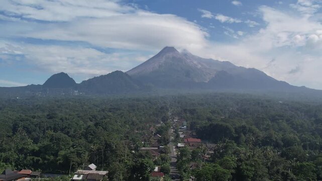 Majestic Merapi Volcano Peaks with Early Morning Clouds