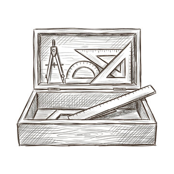 Drafting tools in wooden box, engineering, geometry, drawing compass, ruler, triangles