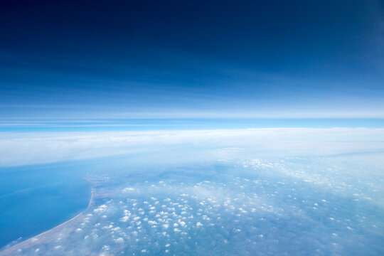 Clouds, a view from airplane window. Sky background