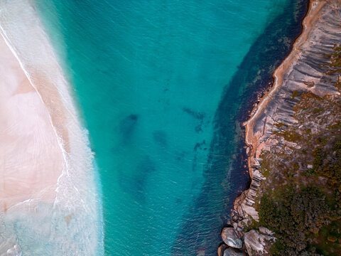 Aerial view of Muttonbird Beach featuring turquoise waters, white sand, and rocky coastline in Elleker, Western Australia, Australia.
