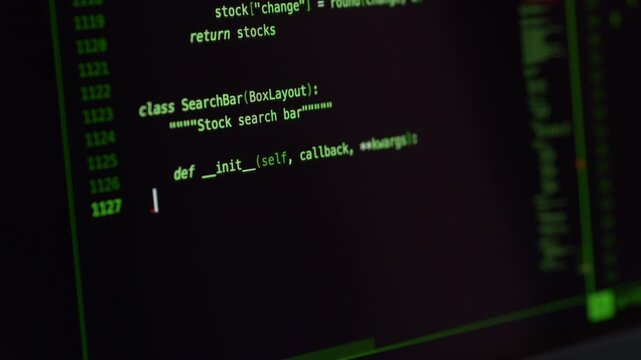 Green source code fills computer screen during vibe coding session with AI assistant. Modern programming workflow, software engineering, automation and artificial intelligence concept.