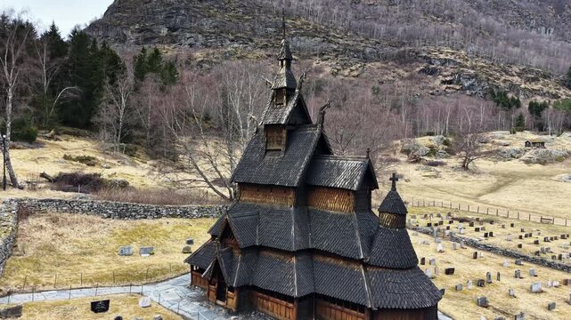 Moody aerial view of Borgund Stave Church on a cloudy spring day, Norway