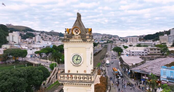 4K drone aerial view of the Clock Tower at Juiz de Fora City Hall in Minas Gerais, Brazil, overlooking the historic downtown.
