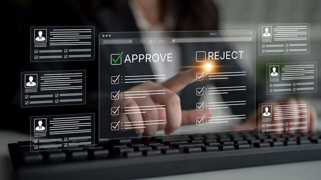 Business professional evaluating digital applications with approval and rejection options on a computer screen, highlighting the decision-making process in modern technology. Bitwise.