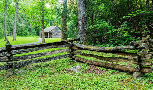 Split Rail Fence and The Historic Carter Shields Log Cabin in Cades Cove, Great Smoky Mountains National Park, Tennessee, USA