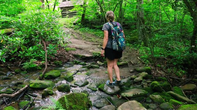 Female Hiker at The Old John Messner Farm, Porters Creek Trail, Great Smoky Mountains National Park, Tennessee, USA