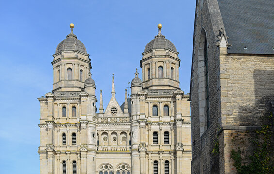 Front gable of Saint Michaels church with blue sky in the centre of the archdiocese Dijon, France