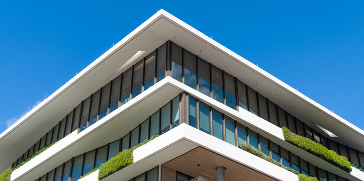 Residential building multistory architecture. Architectural exterior detail. Exterior fragment. Hotel architecture. Modern apartment building. Apartment building with detail. Apartment hotel building