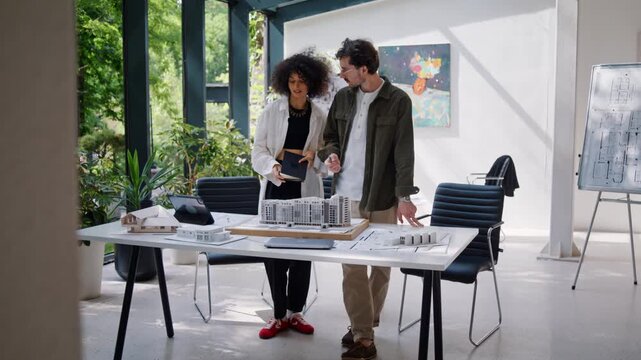 Architect designers prepare sustainable building presentations