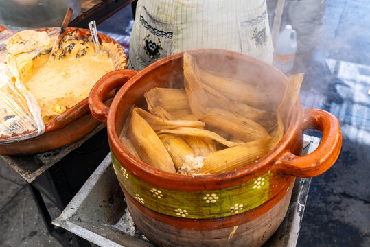 Steaming Corn Tamales Cooking in a Clay Pot at a Mexican Street Food Market